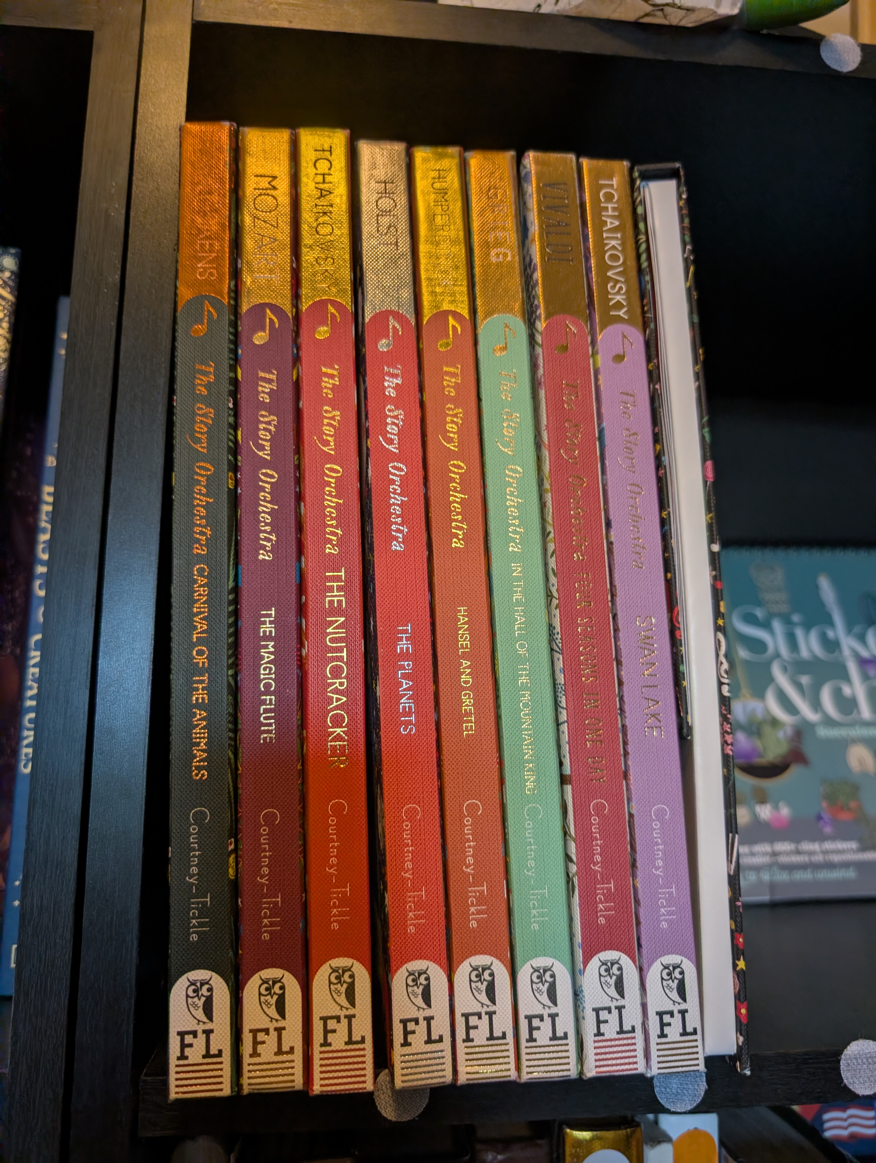 A row of Story Orchestra books, including The Nutcracker, Swan Lake, and Carnival of the Animals